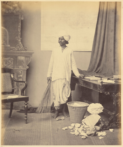 Studio portrait of a man as a mehtar, or a sweeper Circa 1860s