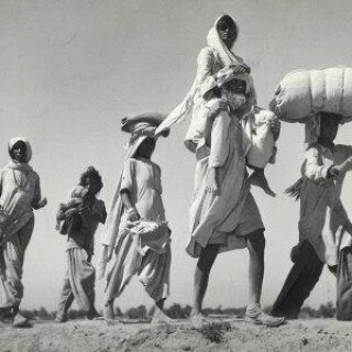 margaret-bourke-white-sikh-carrying-his-wife-on-shoulders-after-the-creation-of-sikh-and-hindu-section-of-punjab-india_u-l-p43kgb0