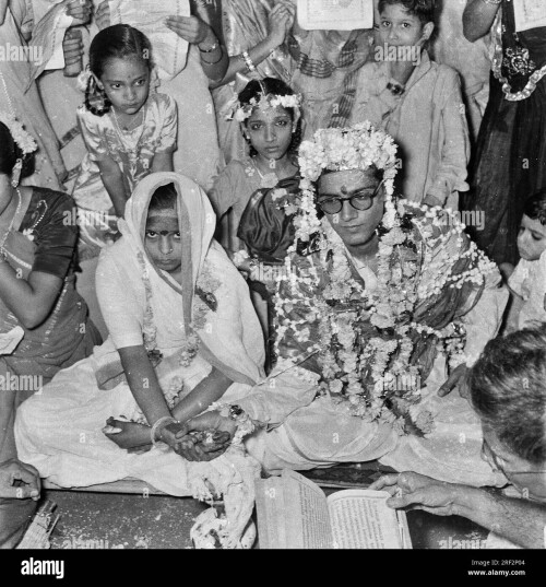 old vintage 1900s black and white picture of indian wedding marriage ceremony bride bridegroom india